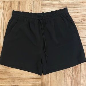 Sanctuary, black high waisted draw string shorts with pockets, size XL